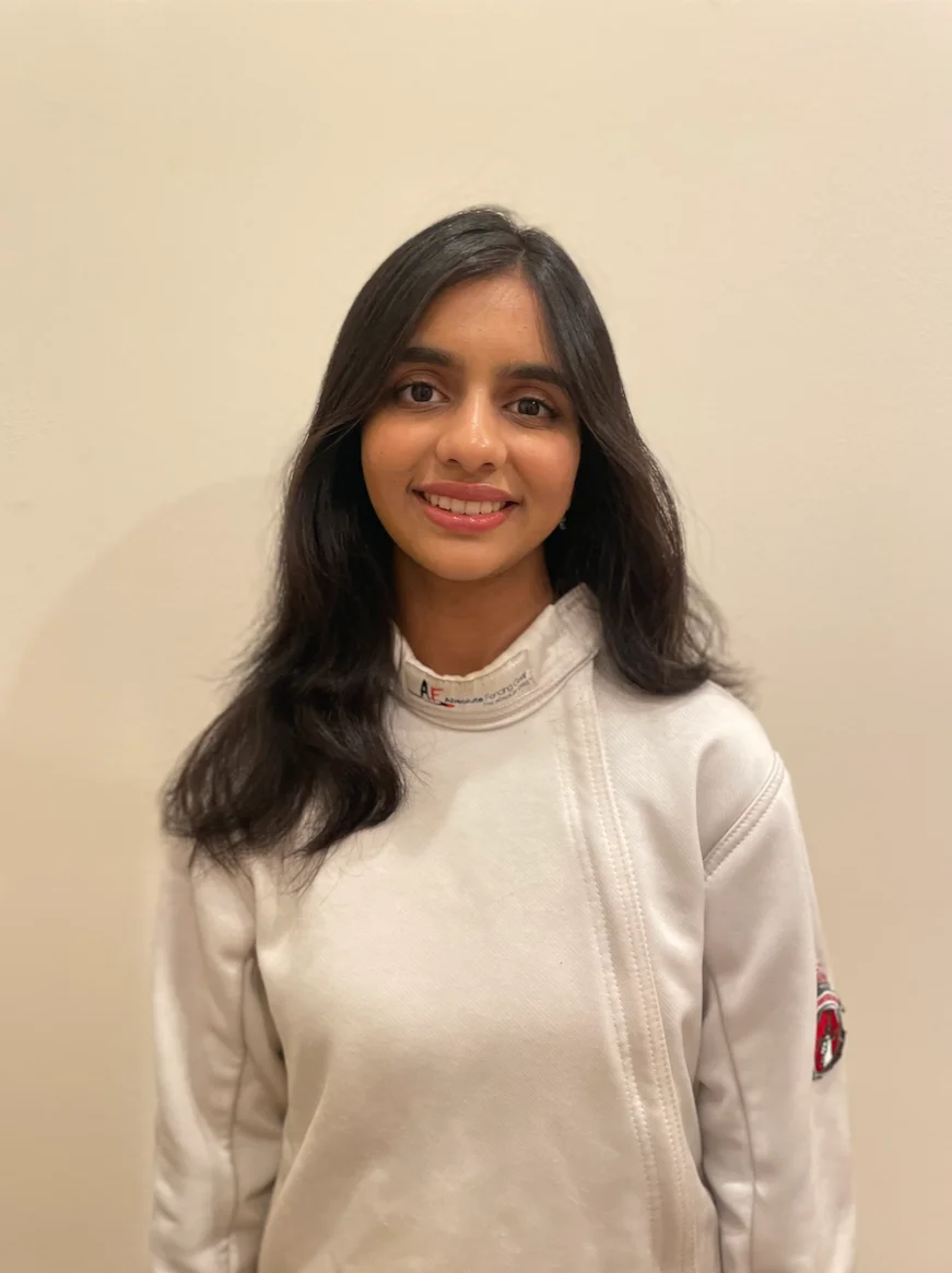 Portrait of Aanya Kandala in fencing gear